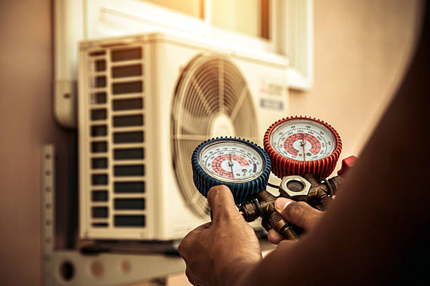 Professional Air Conditioning Service technician working in Rye, NY